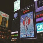 A night view of the Glico Running Man sign from the river.