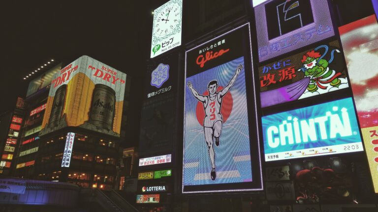 A night view of the Glico Running Man sign from the river.