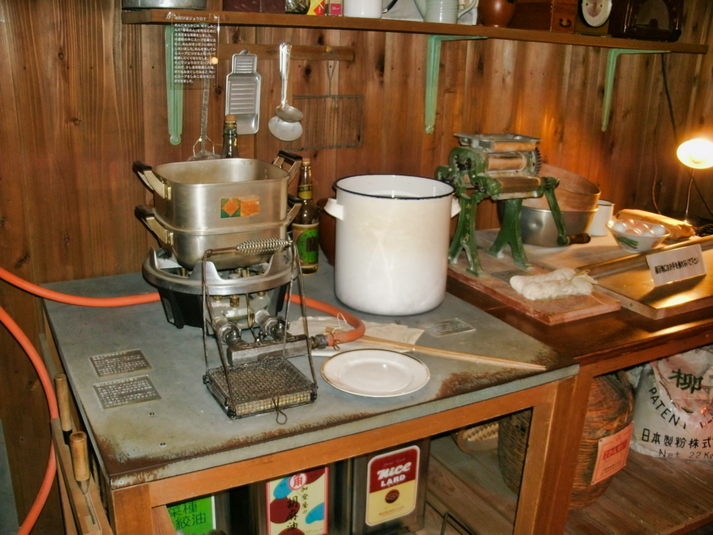 A picture of the workshop kitchen that Momofuku Ando set up inside his shed to invent the technique that would create instant noodles.