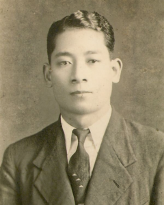 A black and white portrait photo of Momofuku Ando in his 20s.